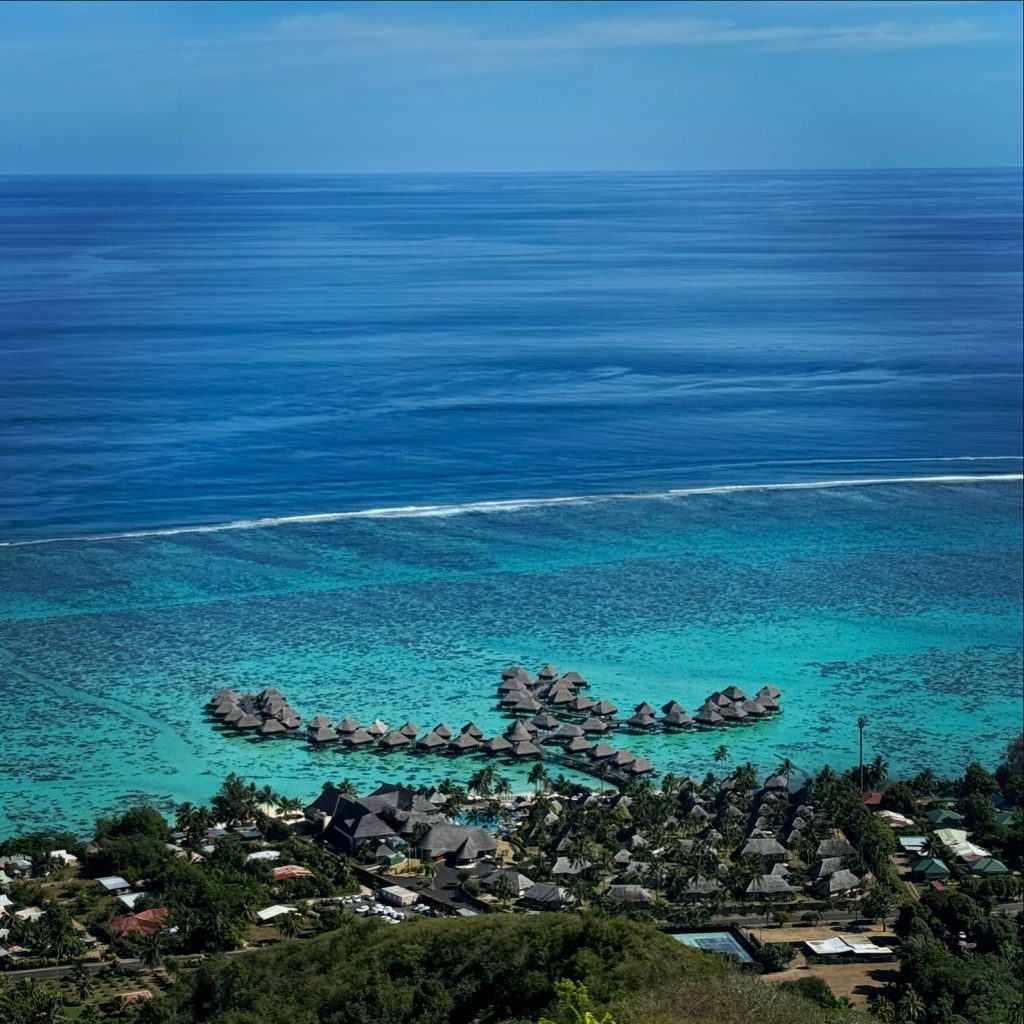 an aerial view of Hilton Moorea Lagoon Resort & Spa in the blue lagoon, Moorea, French Polynesia