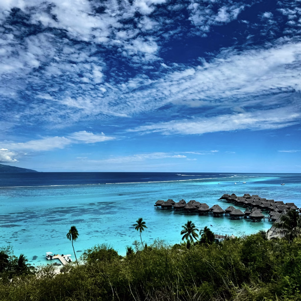 The view of Sofitel Kia Ora Moorea Beach Resort and Tahiti from Toatea Lookout