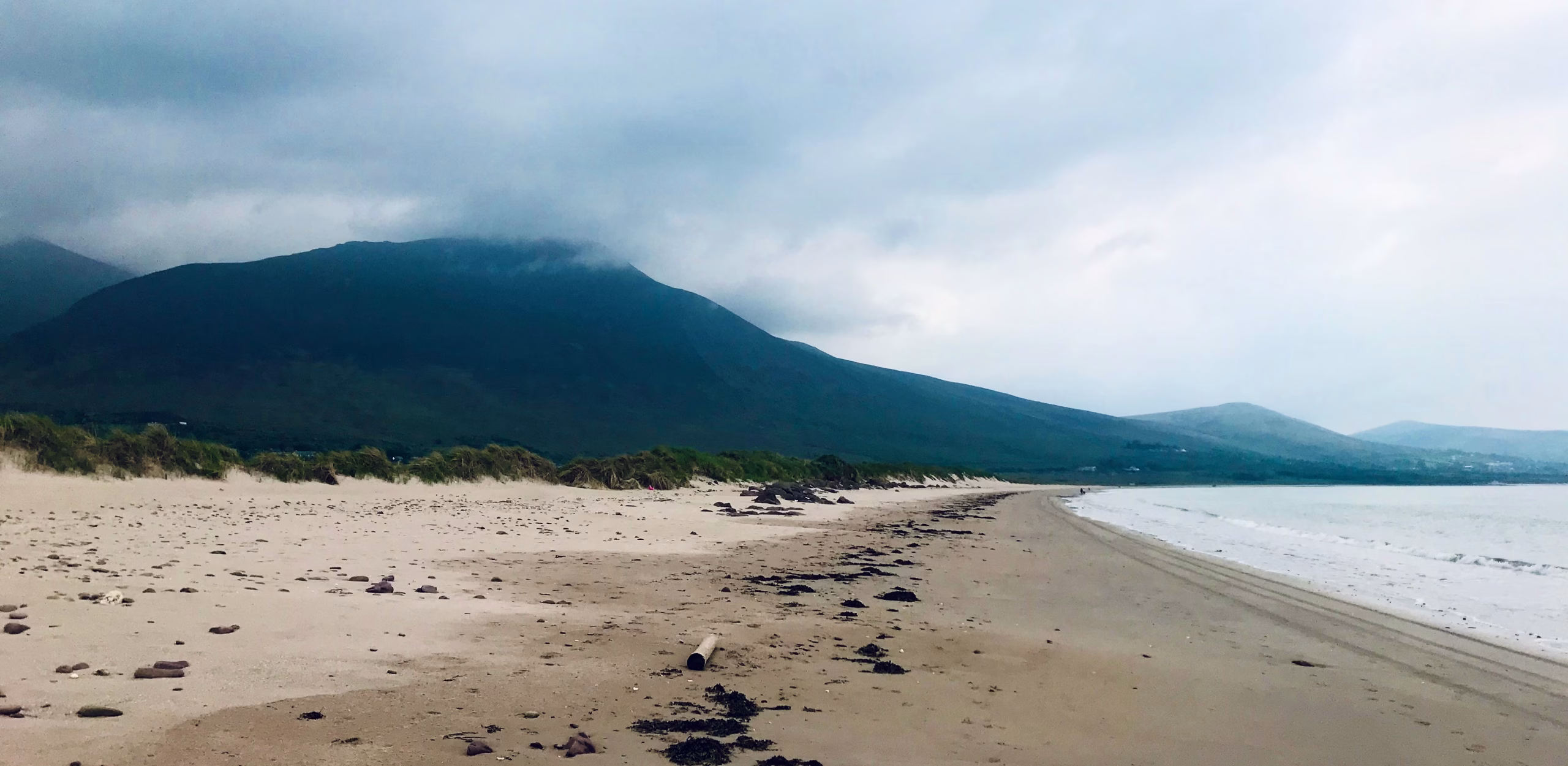 The vast Derrymore Beach, also known as Derrymore Strand, in an overcast day, Ireland