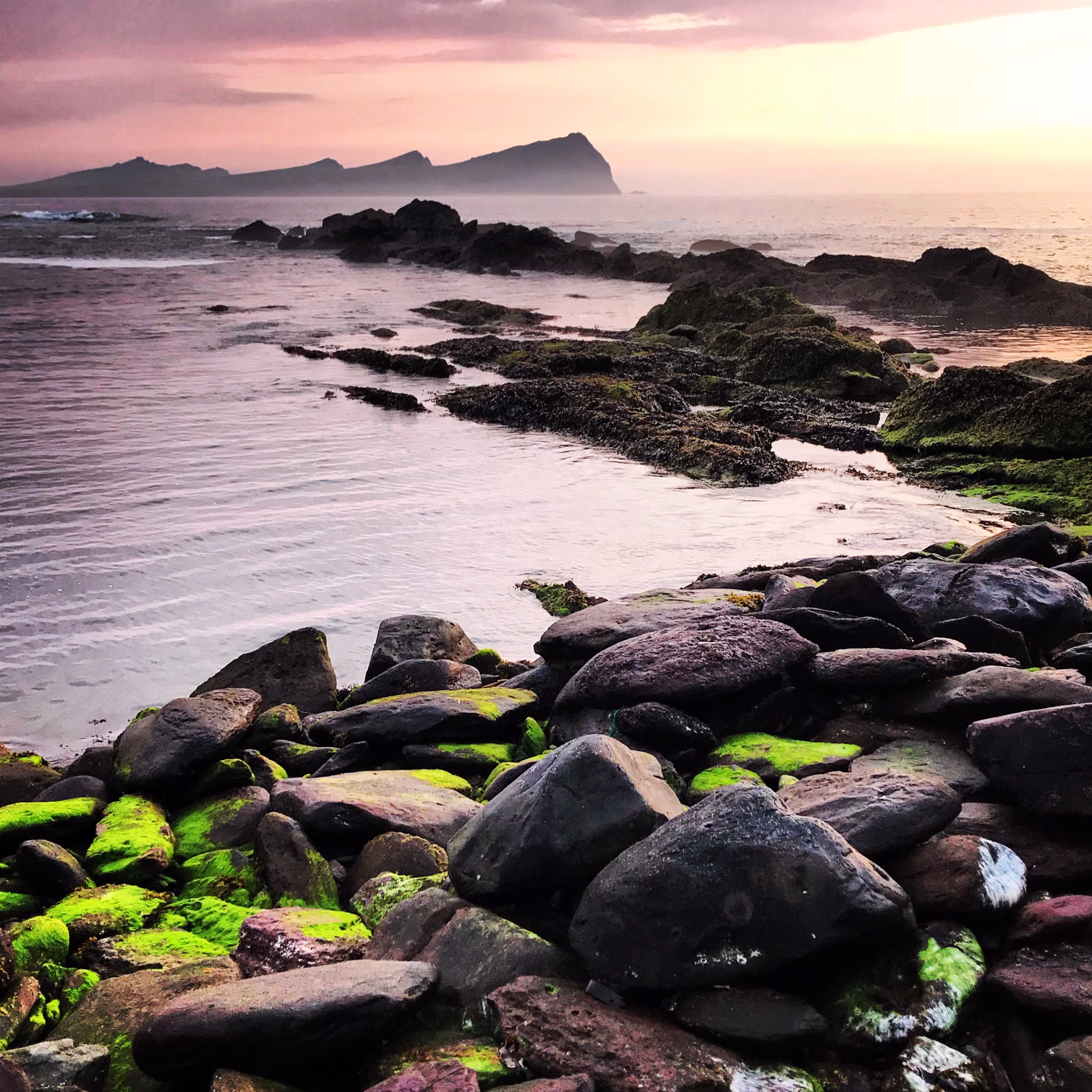 The sunset view of The Three Sisters, known in Irish as "An Triúr Deirféar"